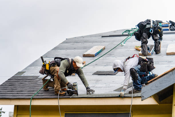 Professional Gutter Installation technician working in Midfield, AL
